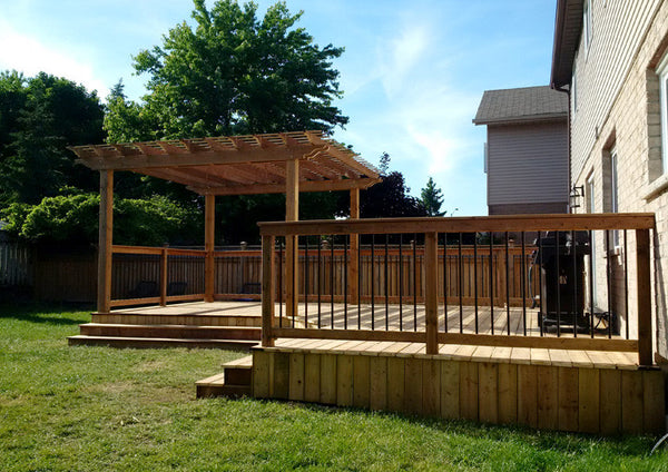 Iron deck railing with arbour pergola Campbell Fence and Deck