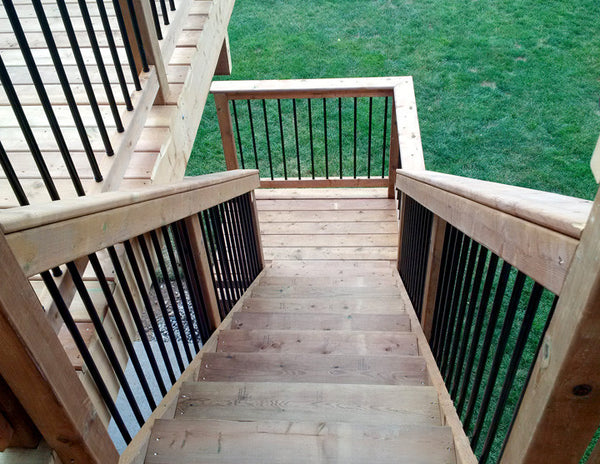 Iron deck railing with stairs Campbell Fence and Deck