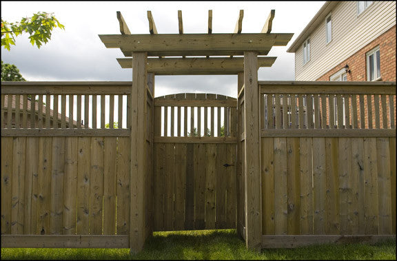 Wood fence with pergola arbour gate in Cambridge by Campbell Fence 